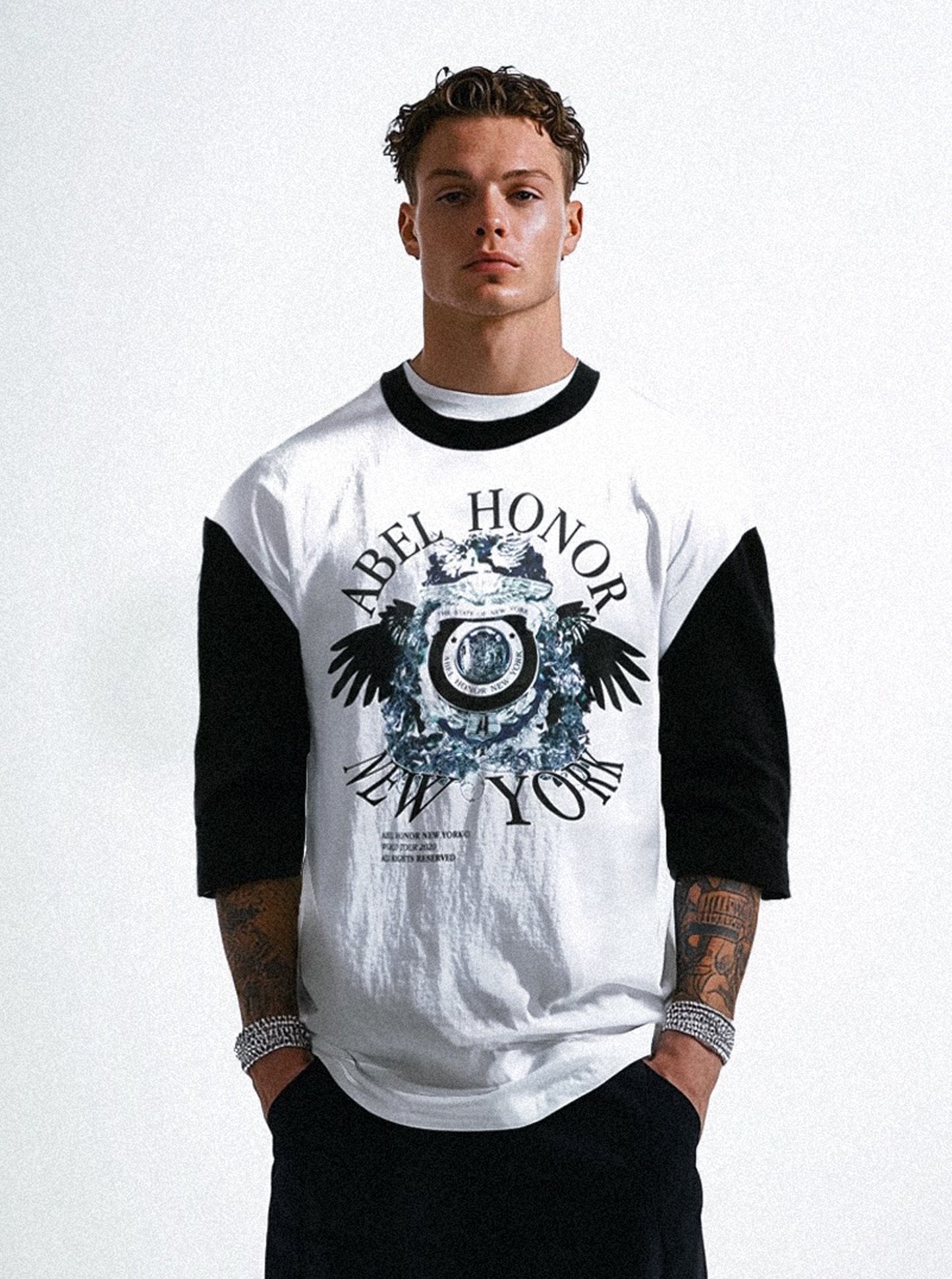 UNISEX RAVEN CREST BASEBALL TEE